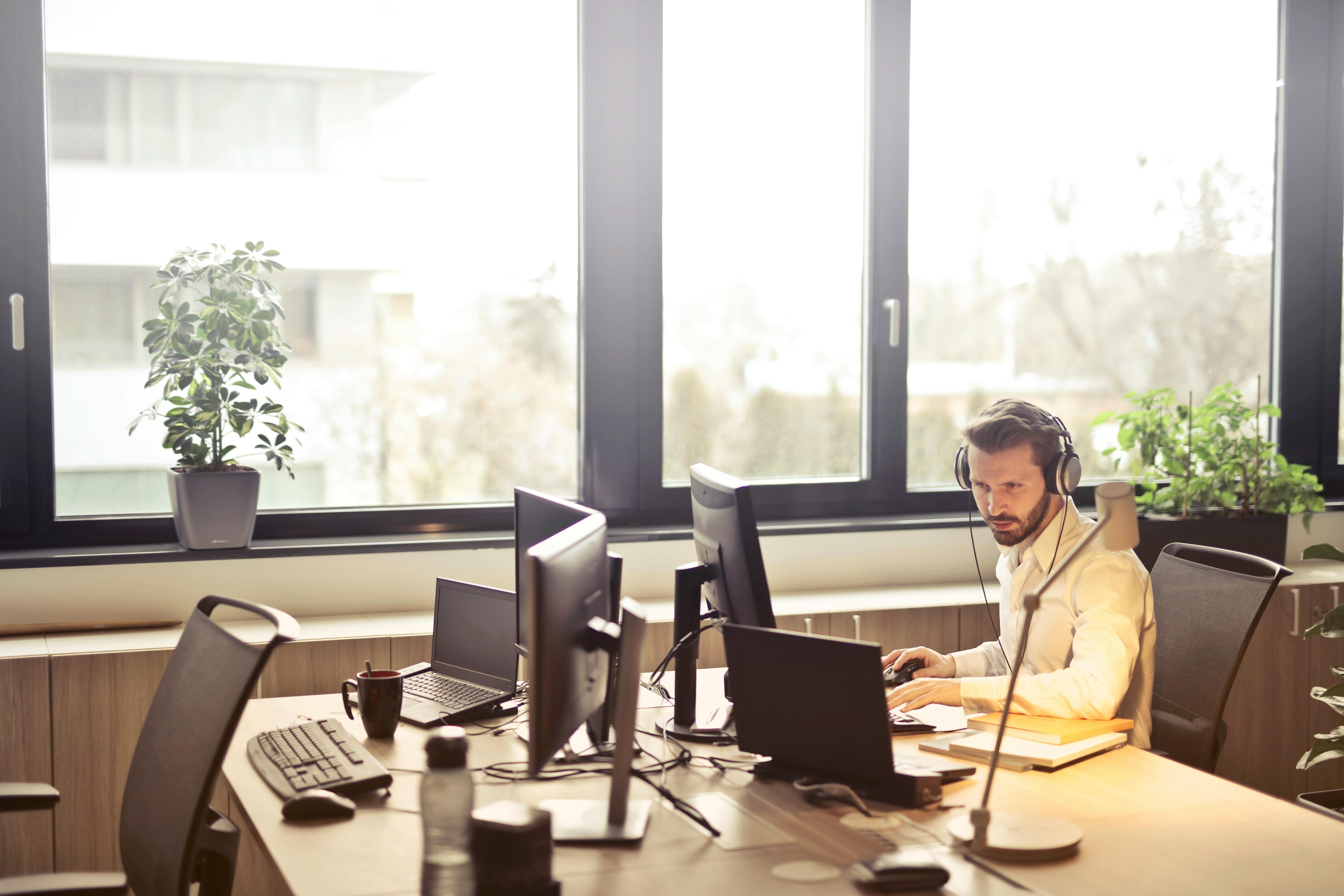 A businessman working at a computer